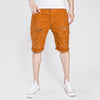 Street washed mid-rise solid color ripped denim shorts